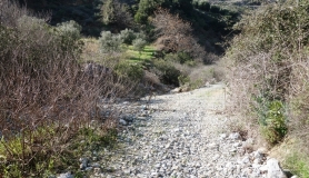 riverbed and fence Kavrochori Korfes loutraki Kavalara moni tilisos mountain bike tour crete