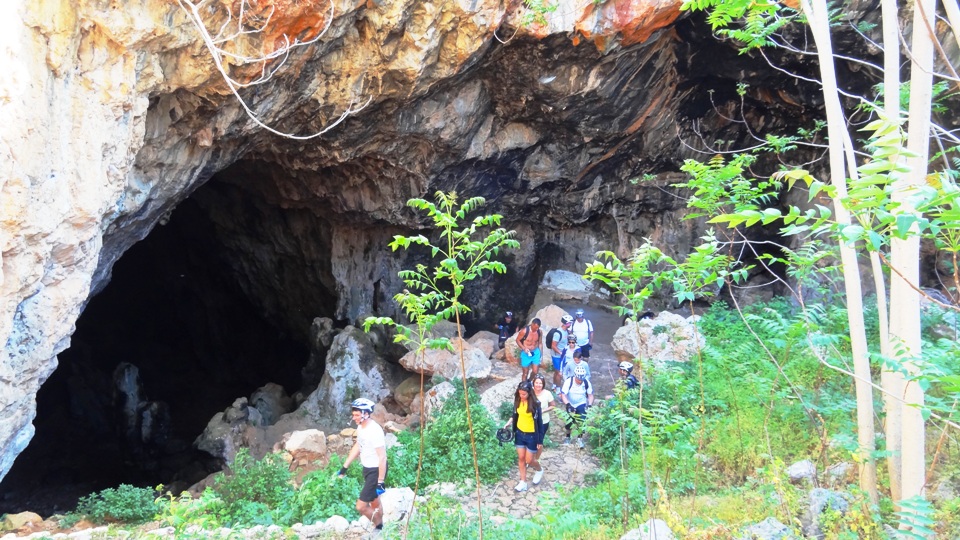 cyclists inside skotino cave near Gouves